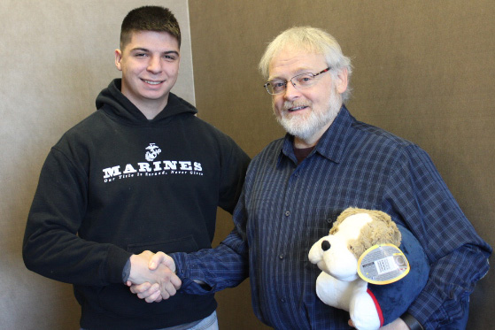Dr. Terry Johnson with U.S. Marine Lance Corporal Andreas Nissen