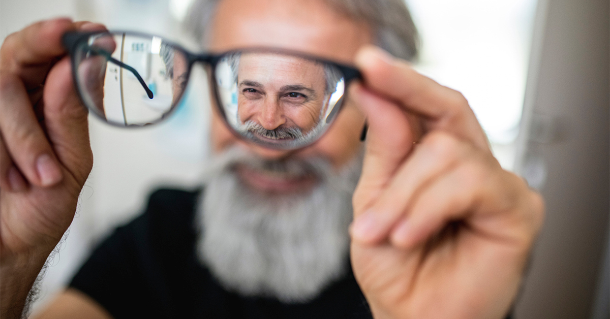 Man looking through his bifocals